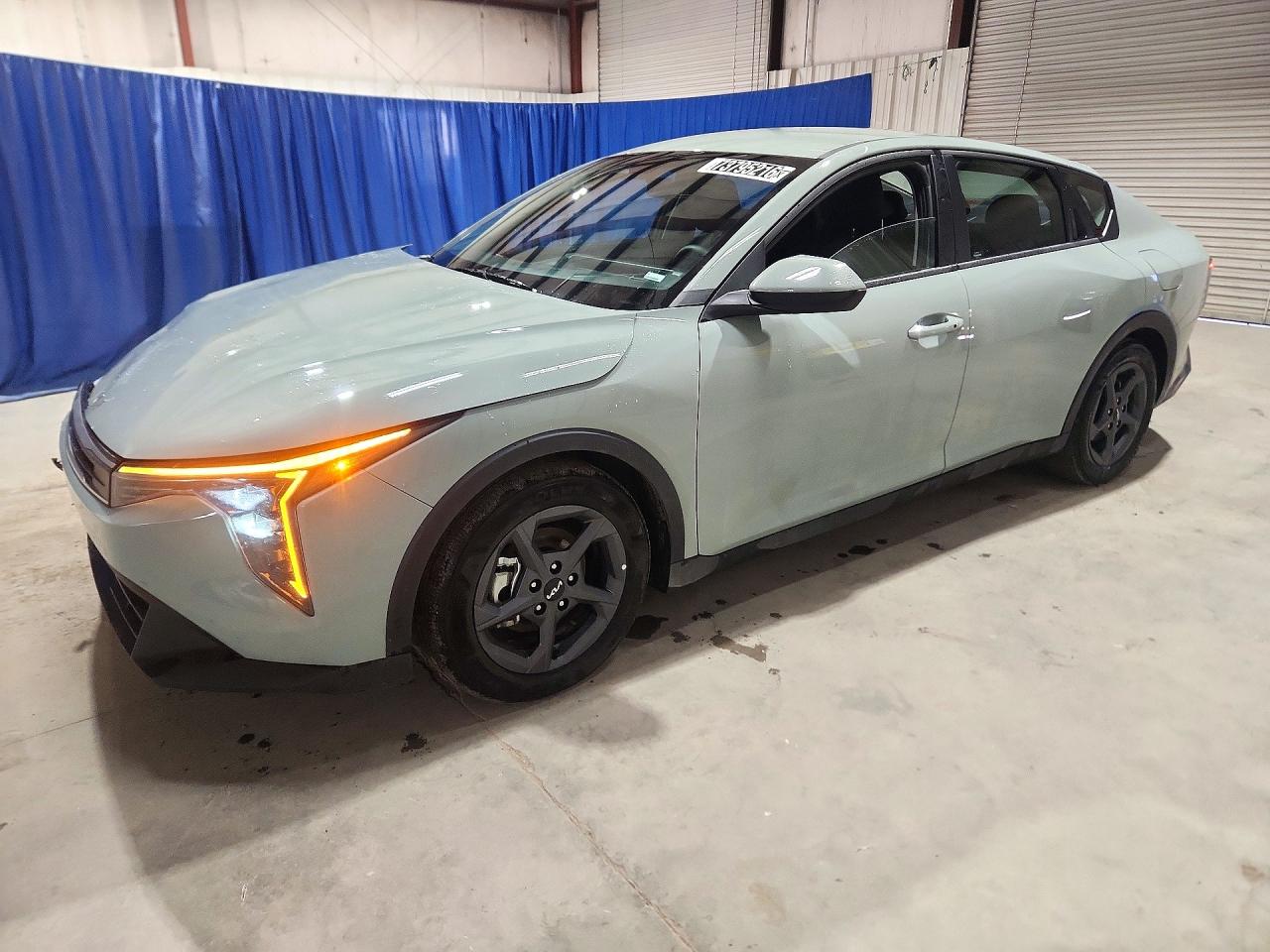2026 KIA K4 LX, LXS — Front 3/4