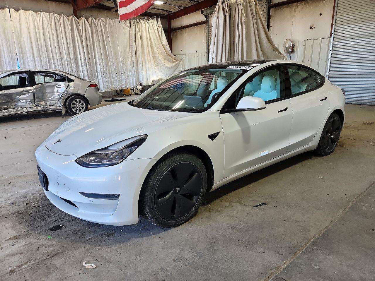 2020 TESLA MODEL 3 — Front 3/4