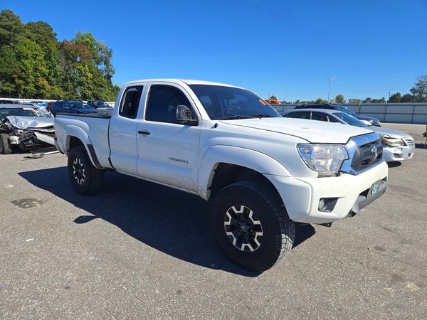 2013 TOYOTA TACOMA Delux — Passenger 3/4