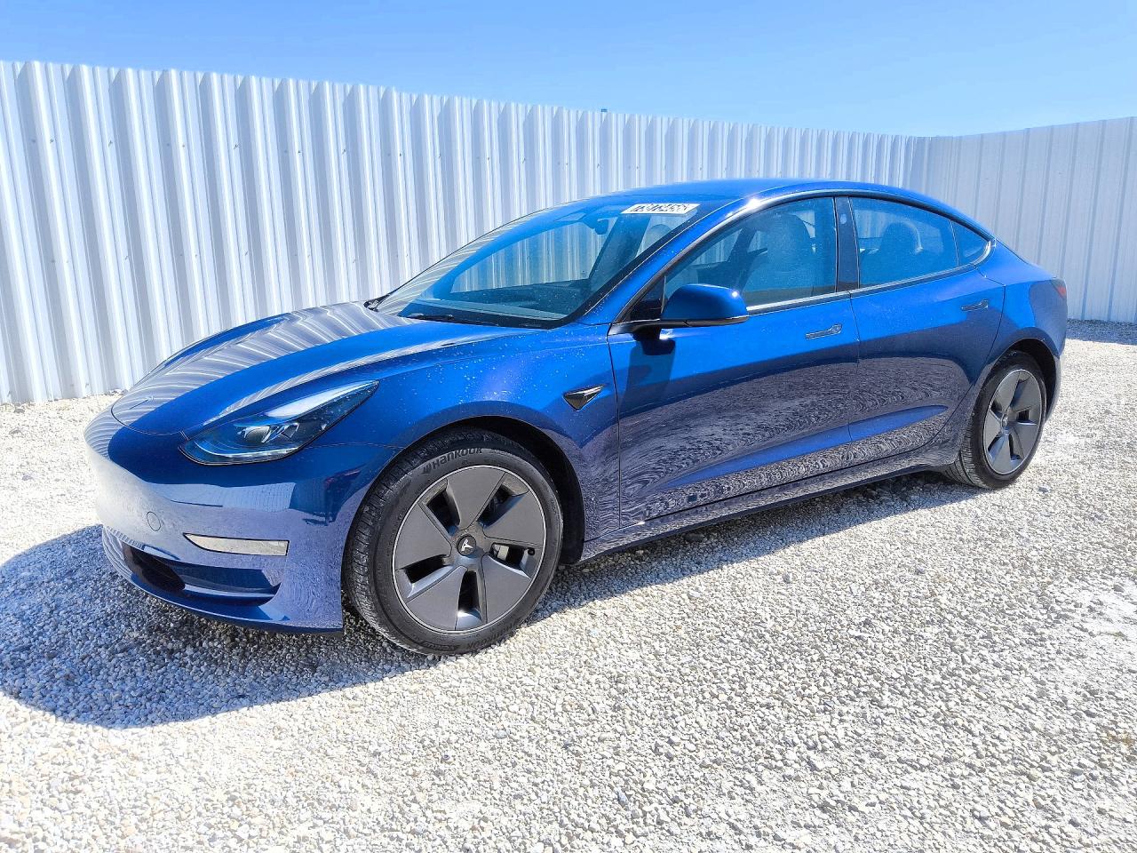 2023 TESLA MODEL 3 — Front 3/4
