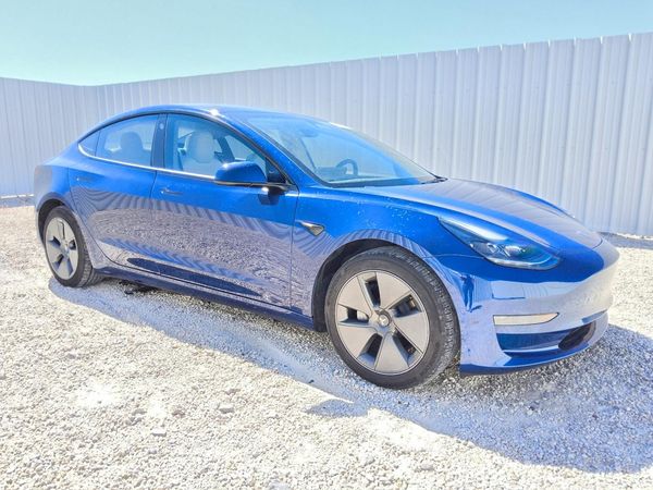 2023 TESLA MODEL 3 — Passenger 3/4