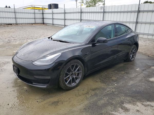 2023 TESLA MODEL 3 — Front 3/4