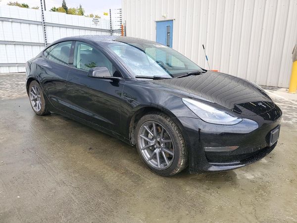 2023 TESLA MODEL 3 — Passenger 3/4