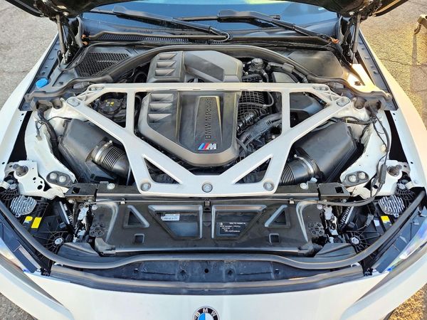 2024 BMW M3 — Engine bay