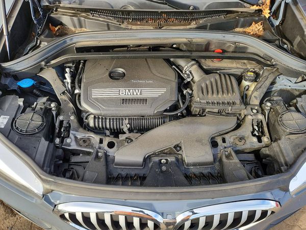 2021 BMW X1 xDrive28i — Engine bay