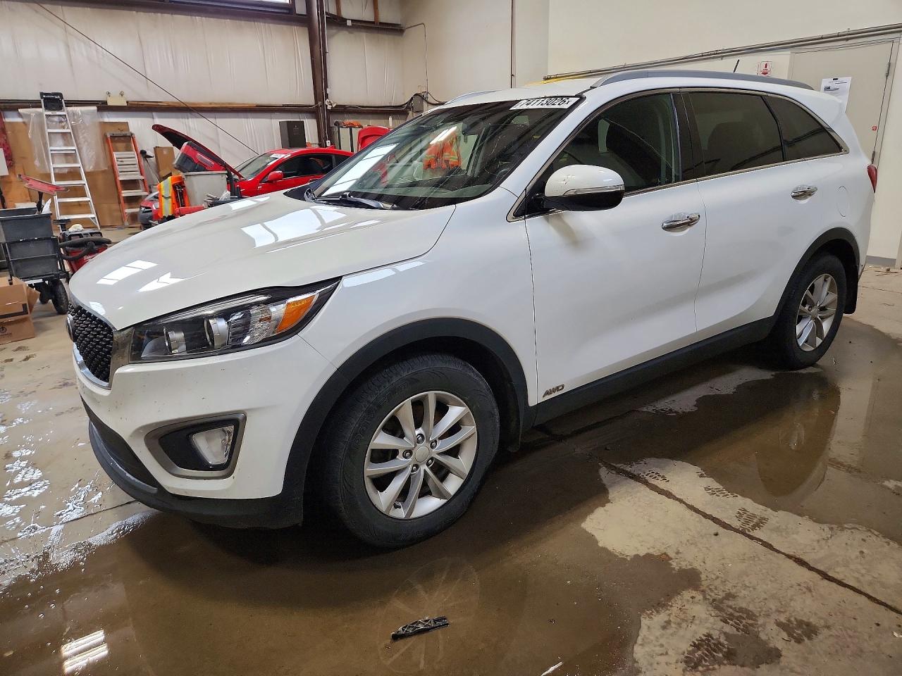 2016 KIA SORENTO L / LX — Front 3/4
