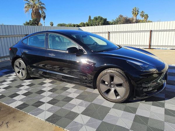 2023 TESLA MODEL 3 — Passenger 3/4