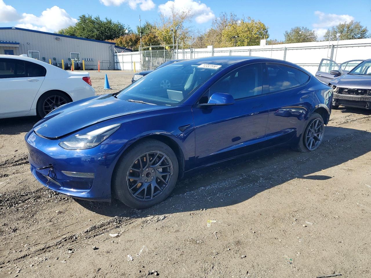 2022 TESLA MODEL 3 — Front 3/4