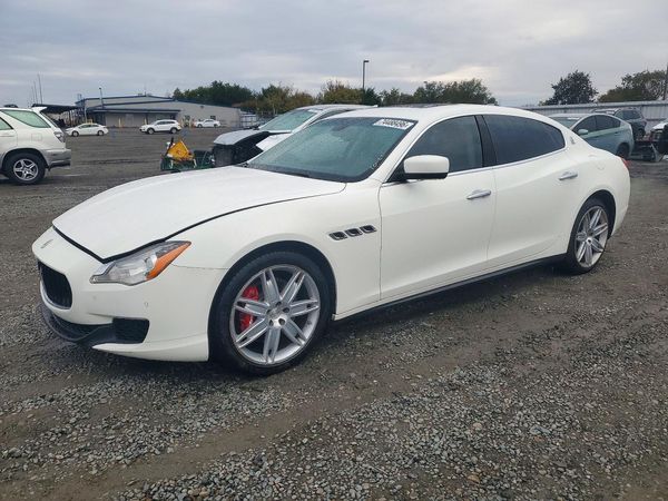 2014 MASERATI QUATTROPORTE Essence — Front 3/4