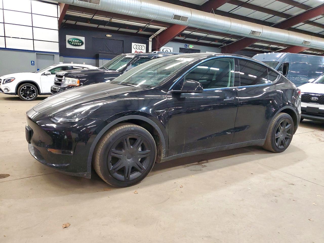 2024 TESLA MODEL  Y — Front 3/4