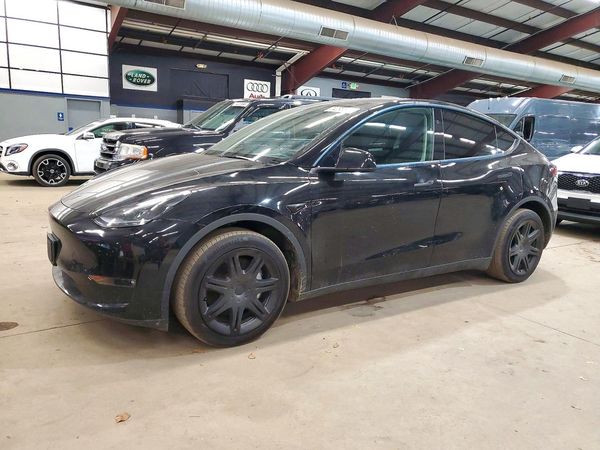 2024 TESLA MODEL  Y — Front 3/4
