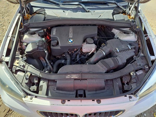 2013 BMW X1 sDrive28i — Engine bay