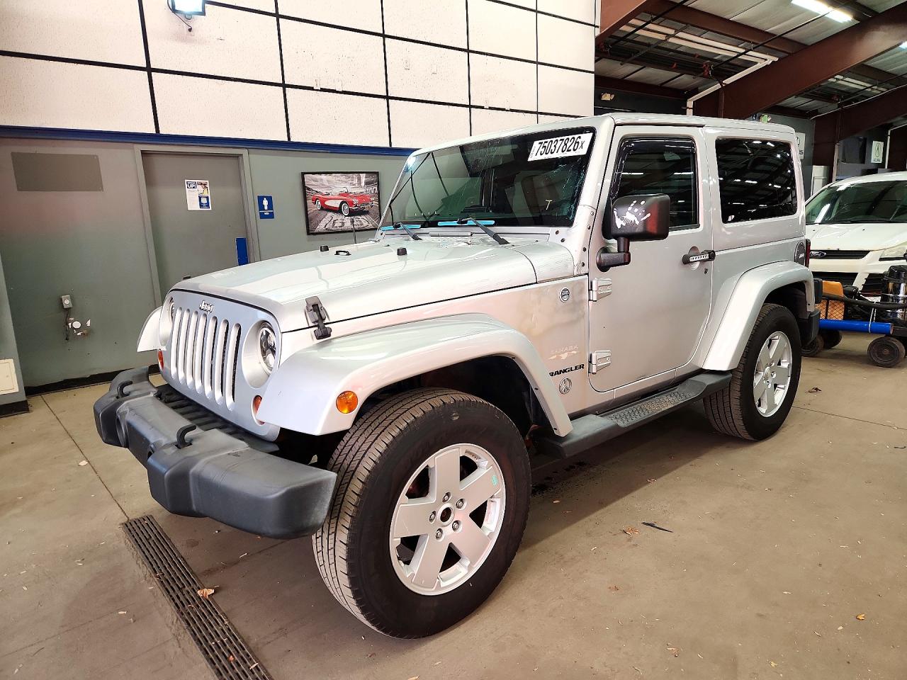 2012 JEEP WRANGLER Sahara — Front 3/4