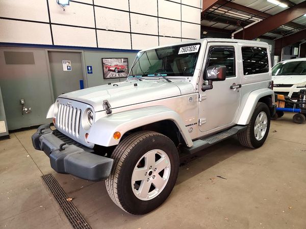 2012 JEEP WRANGLER Sahara — Front 3/4