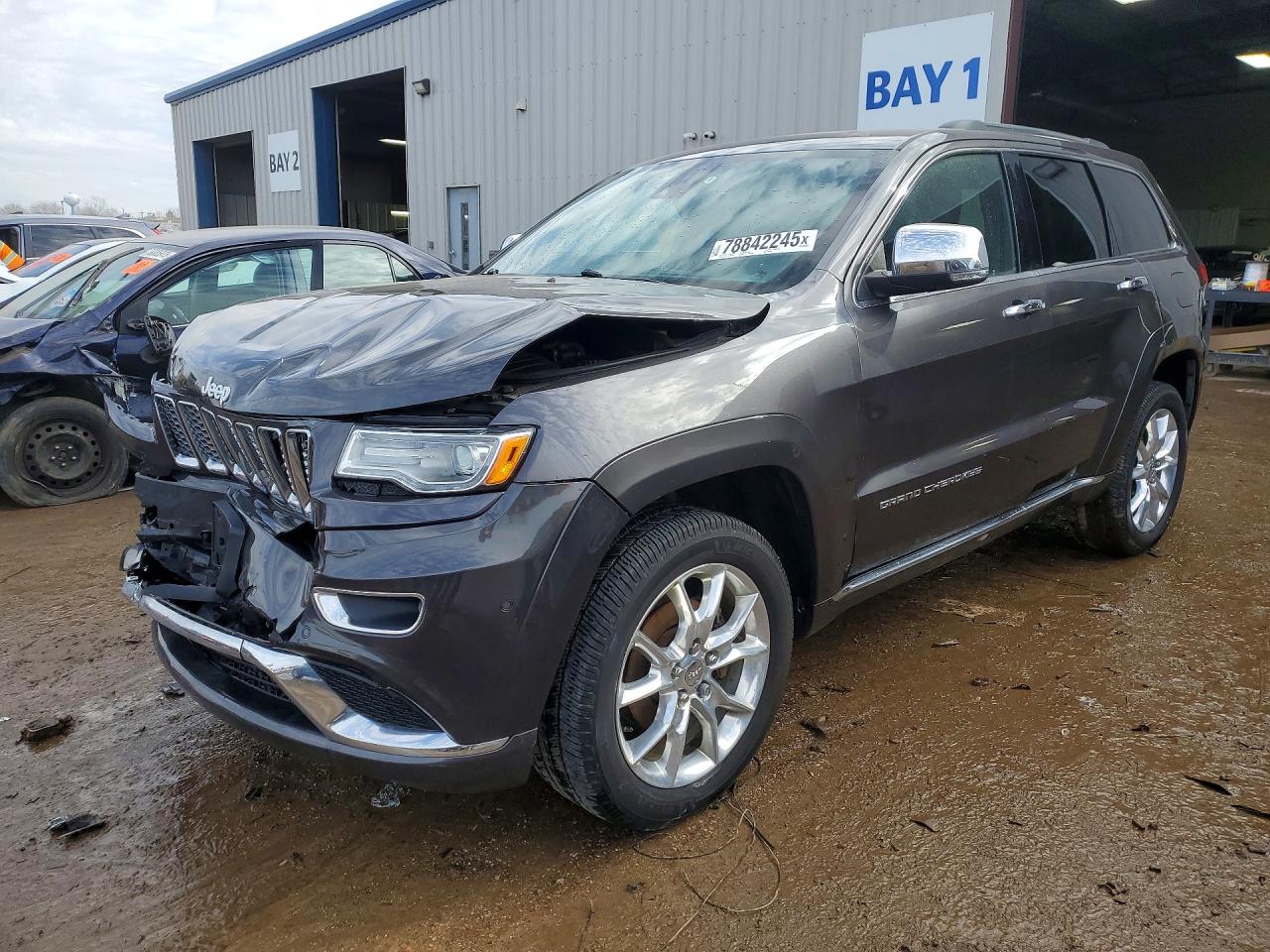 2015 JEEP GRAND CHEROKEE Summit — Front 3/4