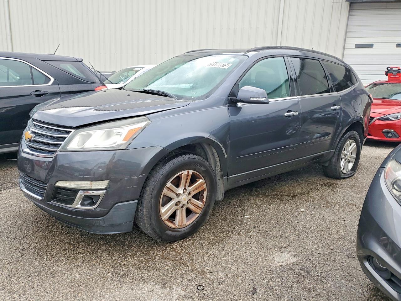 2013 CHEVROLET TRAVERSE 1LT — Front 3/4