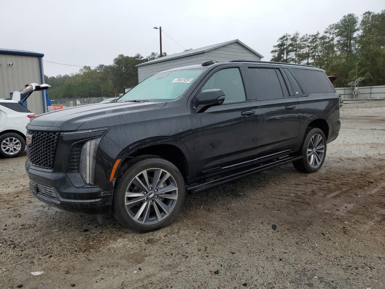 2025 CADILLAC ESCALADE Sport — Front 3/4