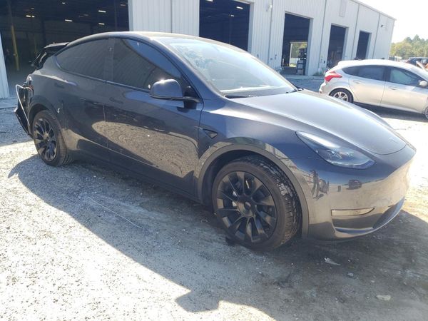 2024 TESLA MODEL Y — Passenger 3/4