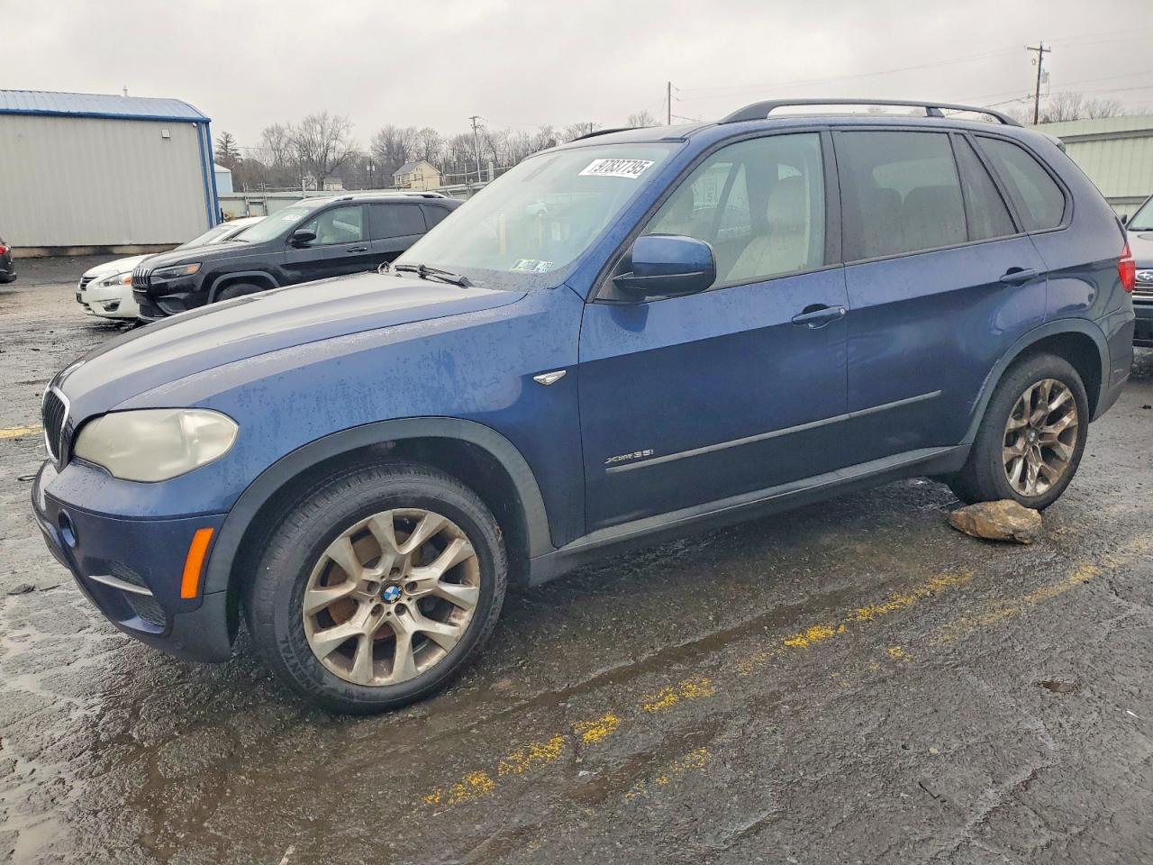 2012 BMW X5 xDrive35i — Front 3/4